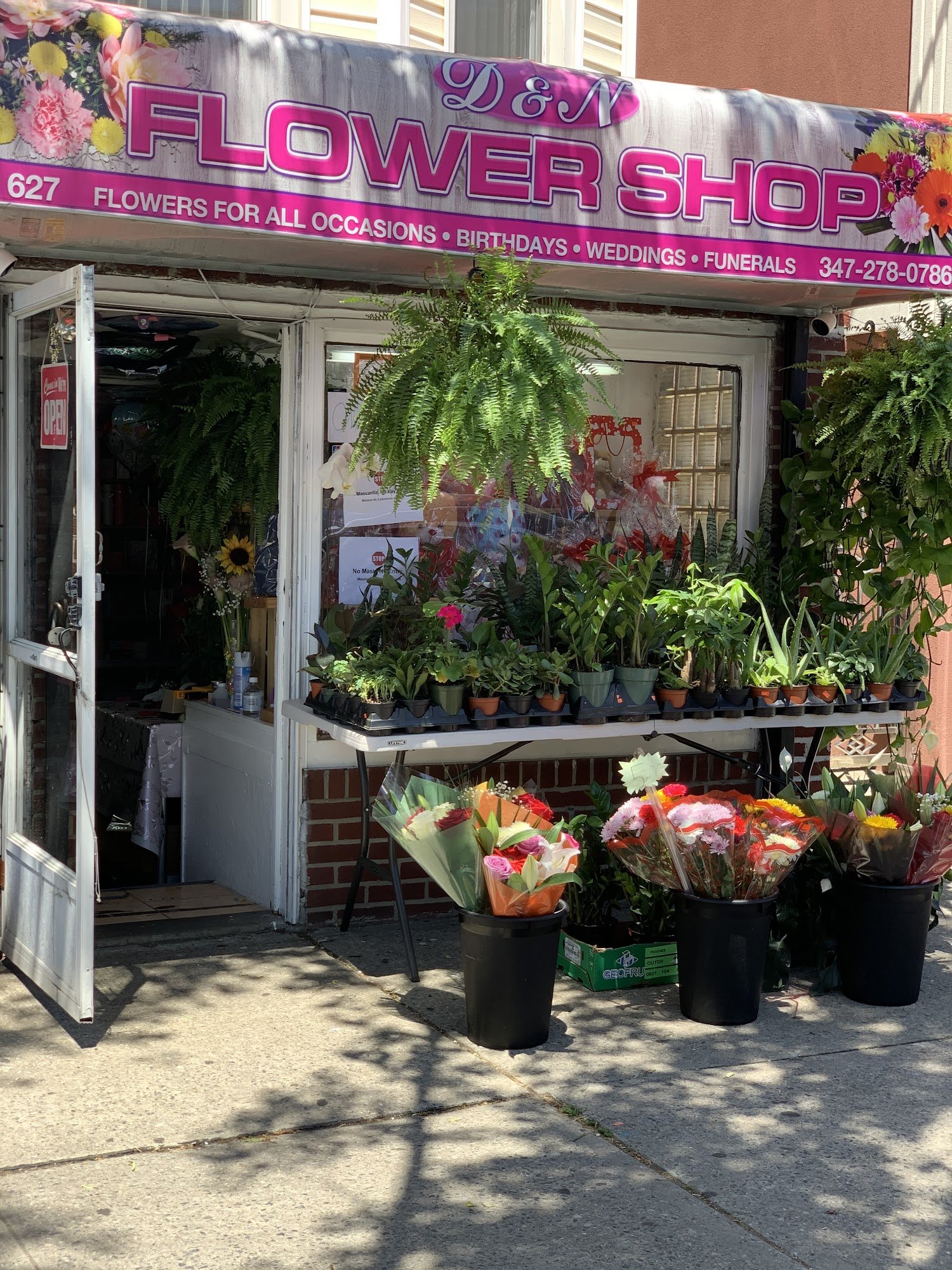 The real D & N Flower Shop storefront, 627 Morris Park Ave, Bronx — the florist the demo page was built for